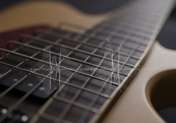 Bass guitar with abstract buzzing lines indicating fret buzz problem